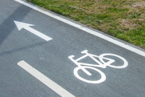 Bicycle Accident Lawyer Pearland, TX - Bike lane sign on asphalt